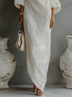 Elegant Flowing Dress in Ivory White with Off-Shoulder Design